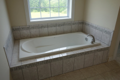 Designer ceramic tile throughout the house
