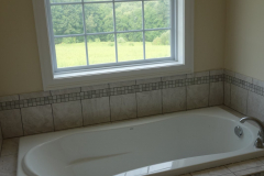 Soaking tub in master bathroom