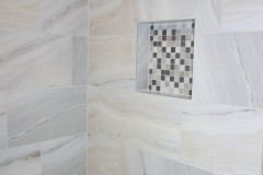 Main bathroom shower with custom tile design