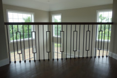 View from second floor balcony into two story family room
