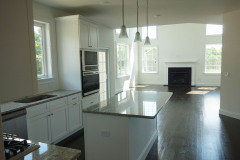 The Essex Grand - kitchen and two-story living room