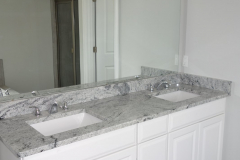 Standard granite countertop in master bathroom