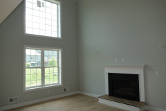 View of the two-story family room at the back of the home View of the two-story family room at the back of the home