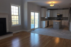 Another view of the open floor plan including kitchen and family room
