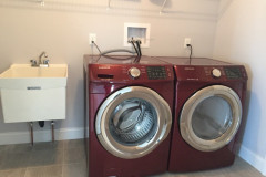 Full size laundry room with utility sink