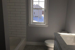 Main bathroom with tiled shower