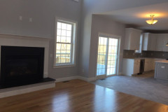 Open floor plan with gas fireplace in family room
