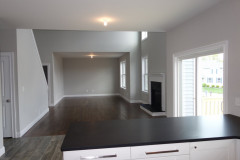 View of two story family room from kitchen