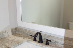 Custom cut granite countertops and backsplash are standard in all bathrooms